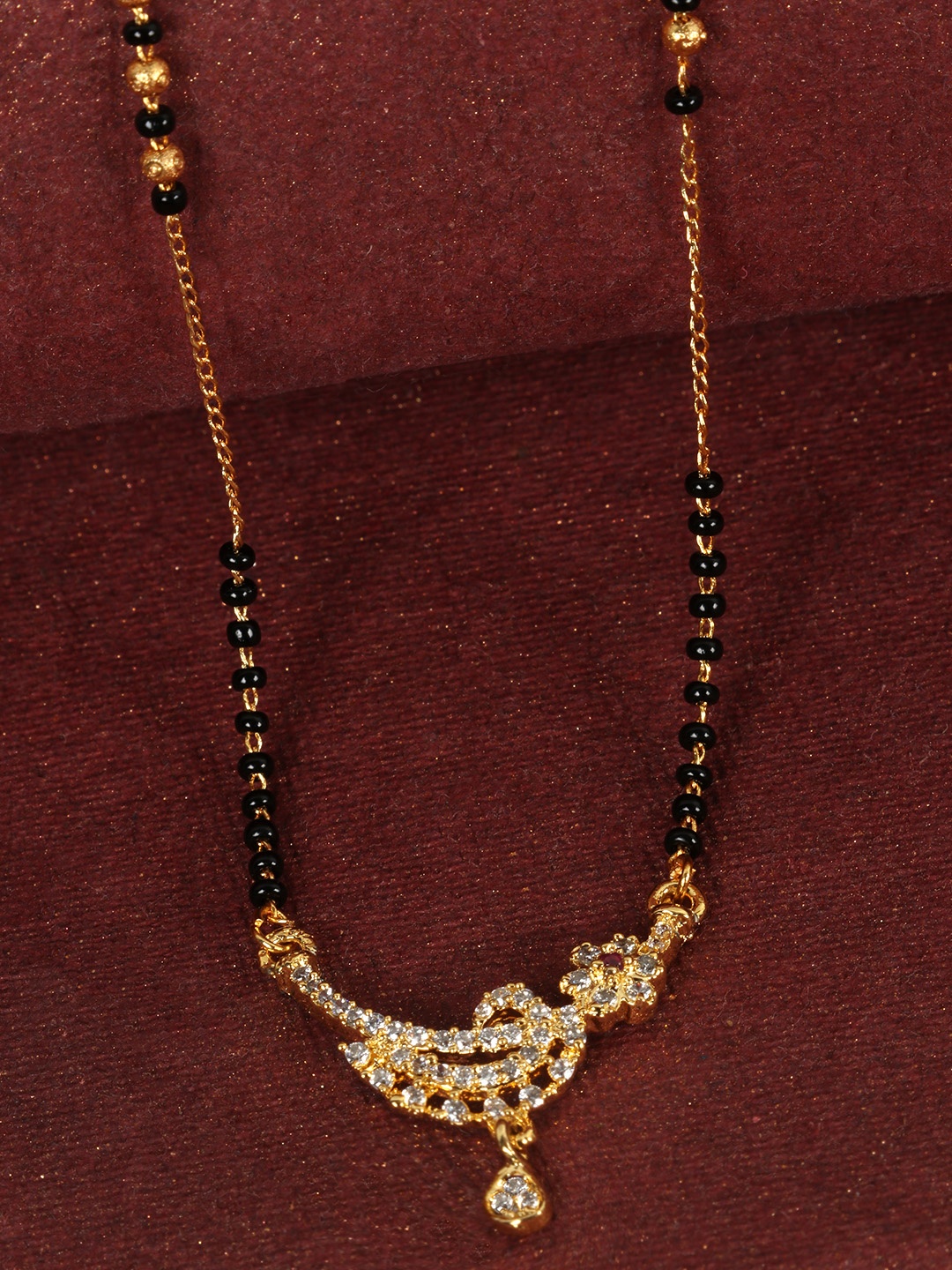 

JEWELS GEHNA Black Gold-Plated AD-Studded & Beaded Mangalsutra