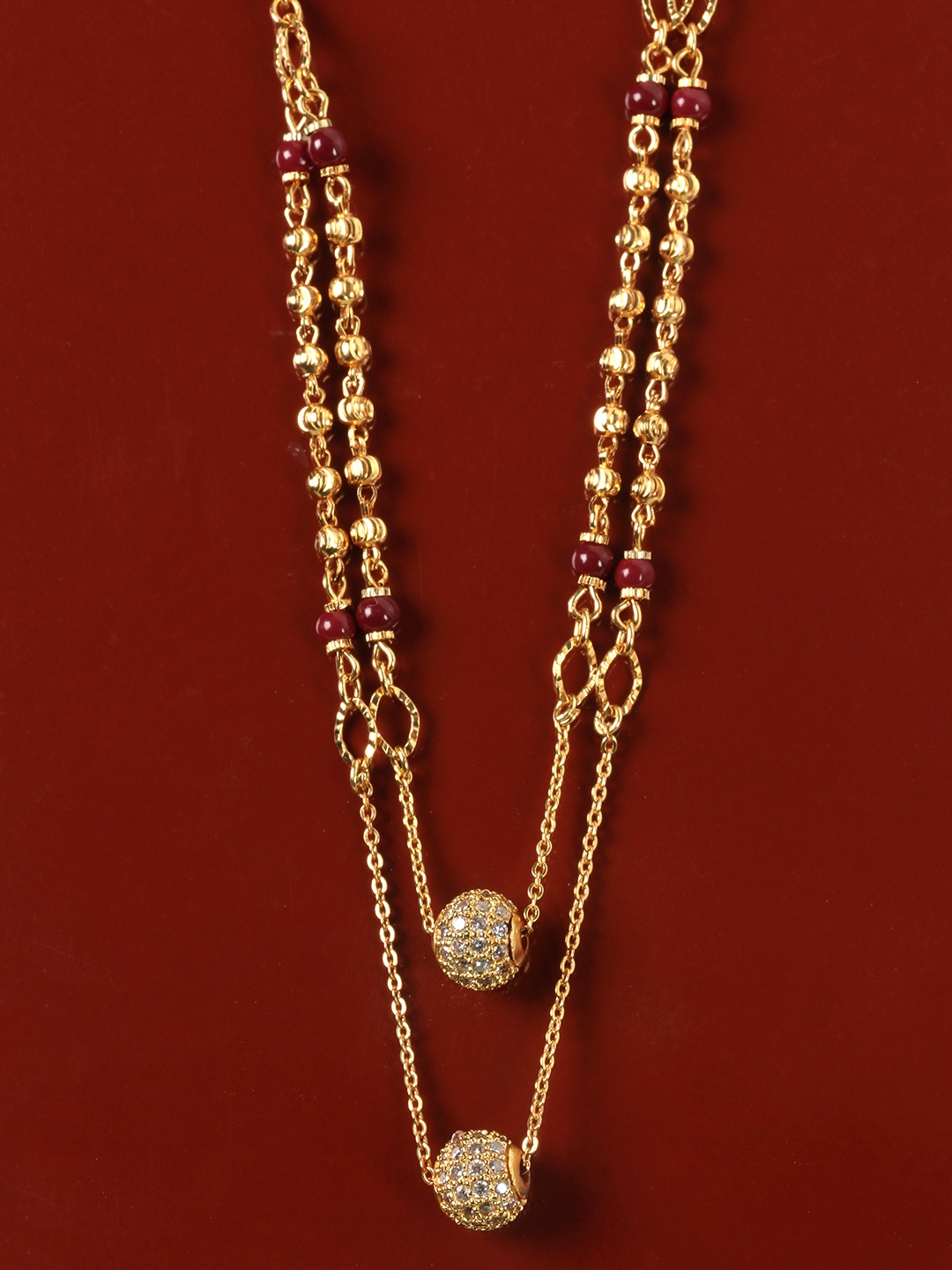 

JEWELS GEHNA Maroon Gold-Plated AD Studded & Beaded Layered Mangalsutra