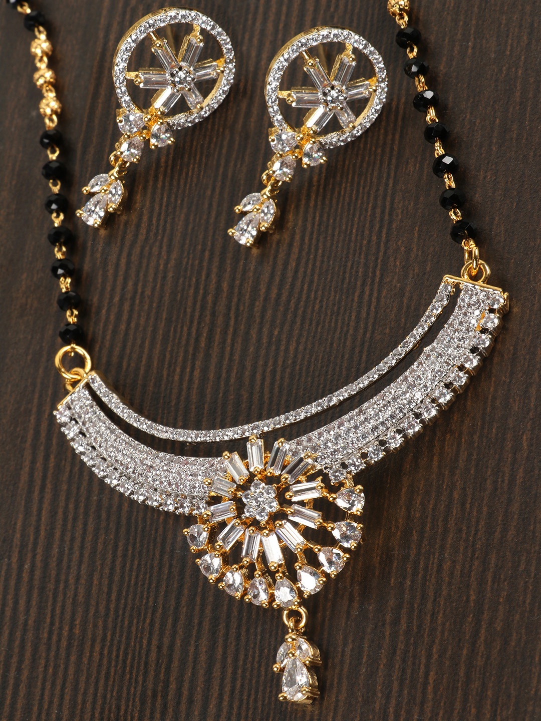 

JEWELS GEHNA Black Gold-Plated AD-Studded Mangalsutra & Earrings Set