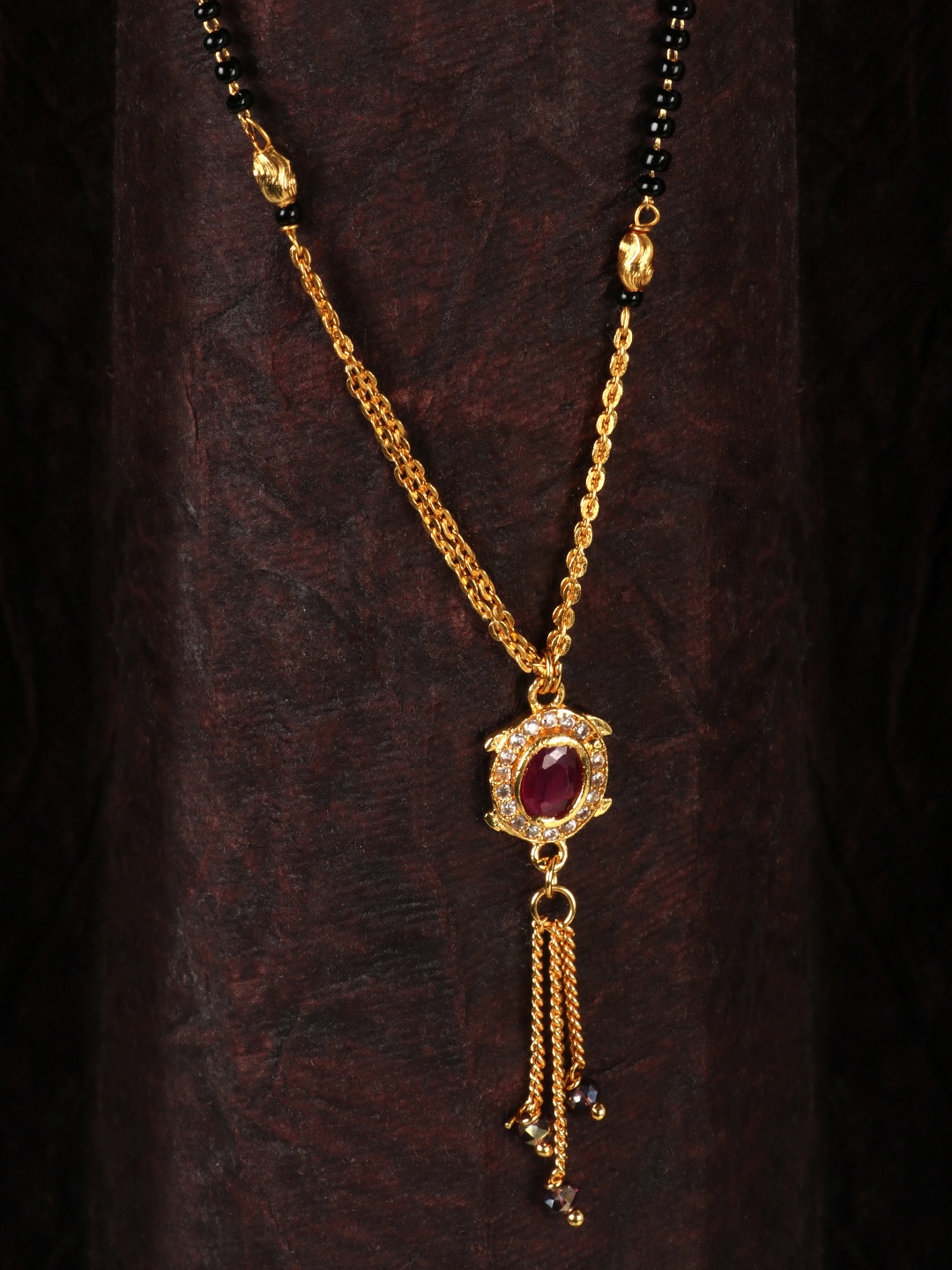 

JEWELS GEHNA Black Gold-Plated AD Studded Beaded Mangalsutra