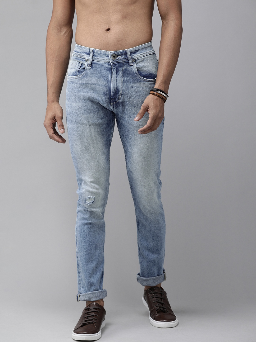 

Roadster Men Blue Skinny Fit Mid-Rise Low Distress Stretchable Jeans