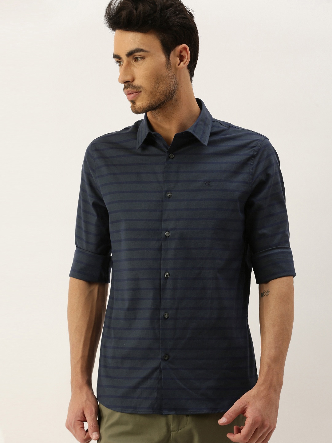 

Calvin Klein Jeans Men Blue Striped Slim Fit Casual Shirt