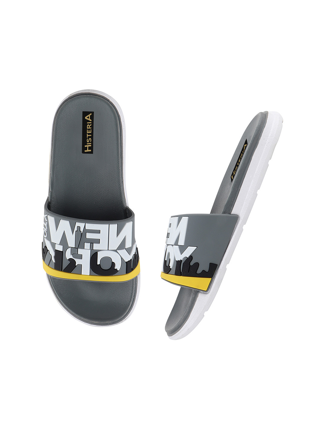 

Histeria Men Grey & Yellow Solid Slip-On