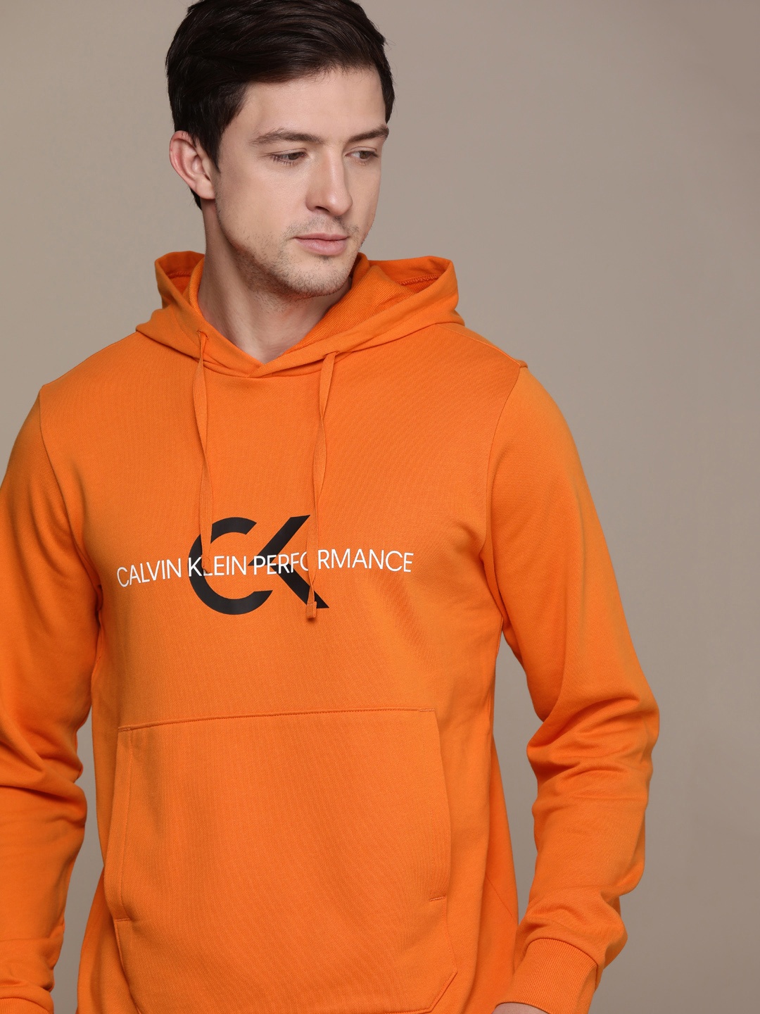 

Calvin Klein Jeans Men Orange & white Printed Hooded Sweatshirt