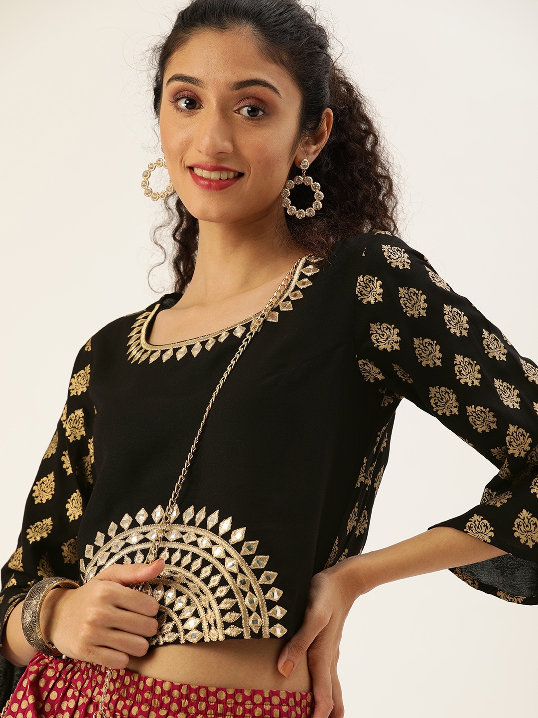 

Varanga Women Black & Gold-Coloured Printed Cropped Regular Top with Embroidered Detail