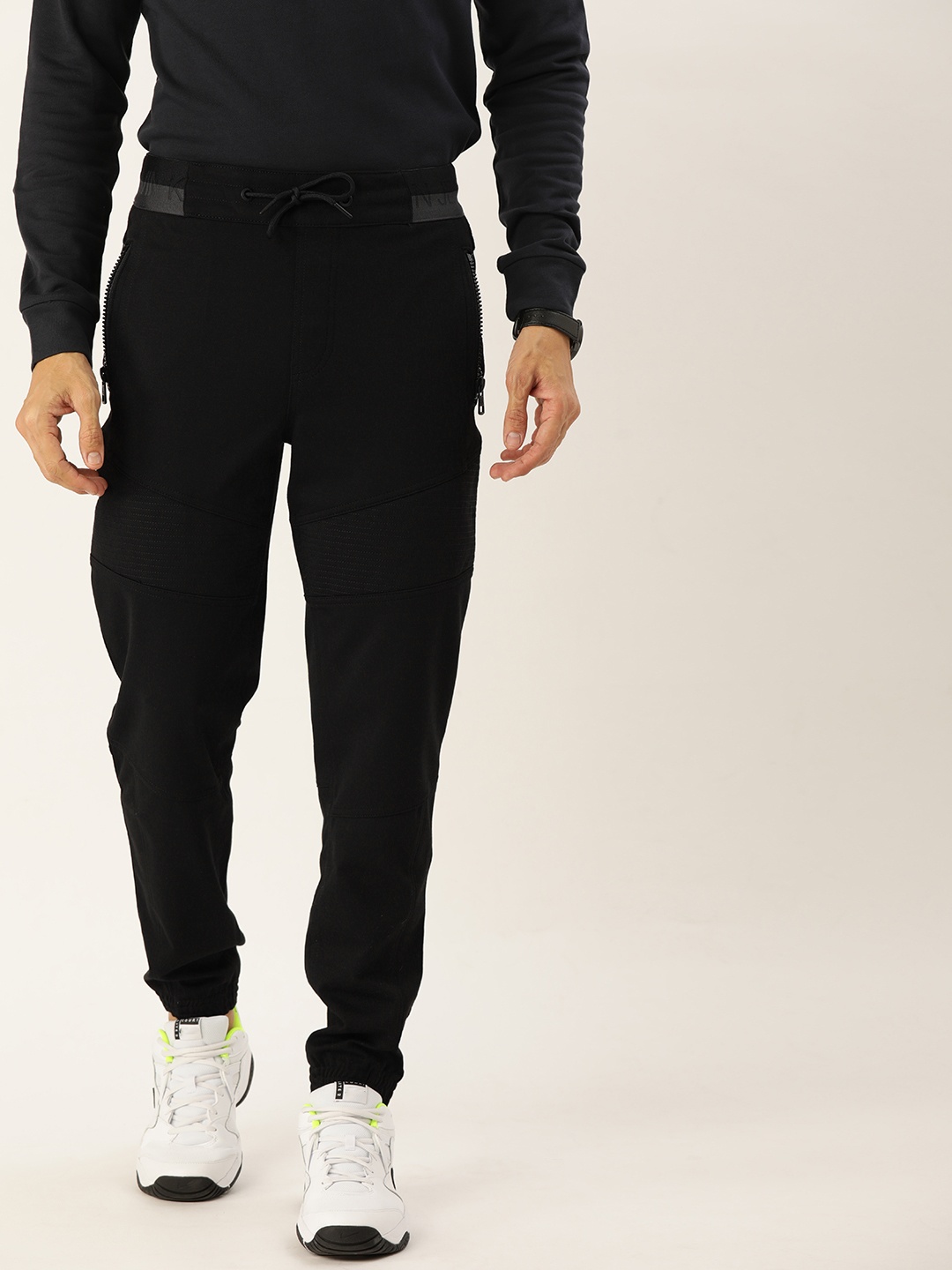 

Calvin Klein Jeans Men Black Solid Slim Fit Joggers