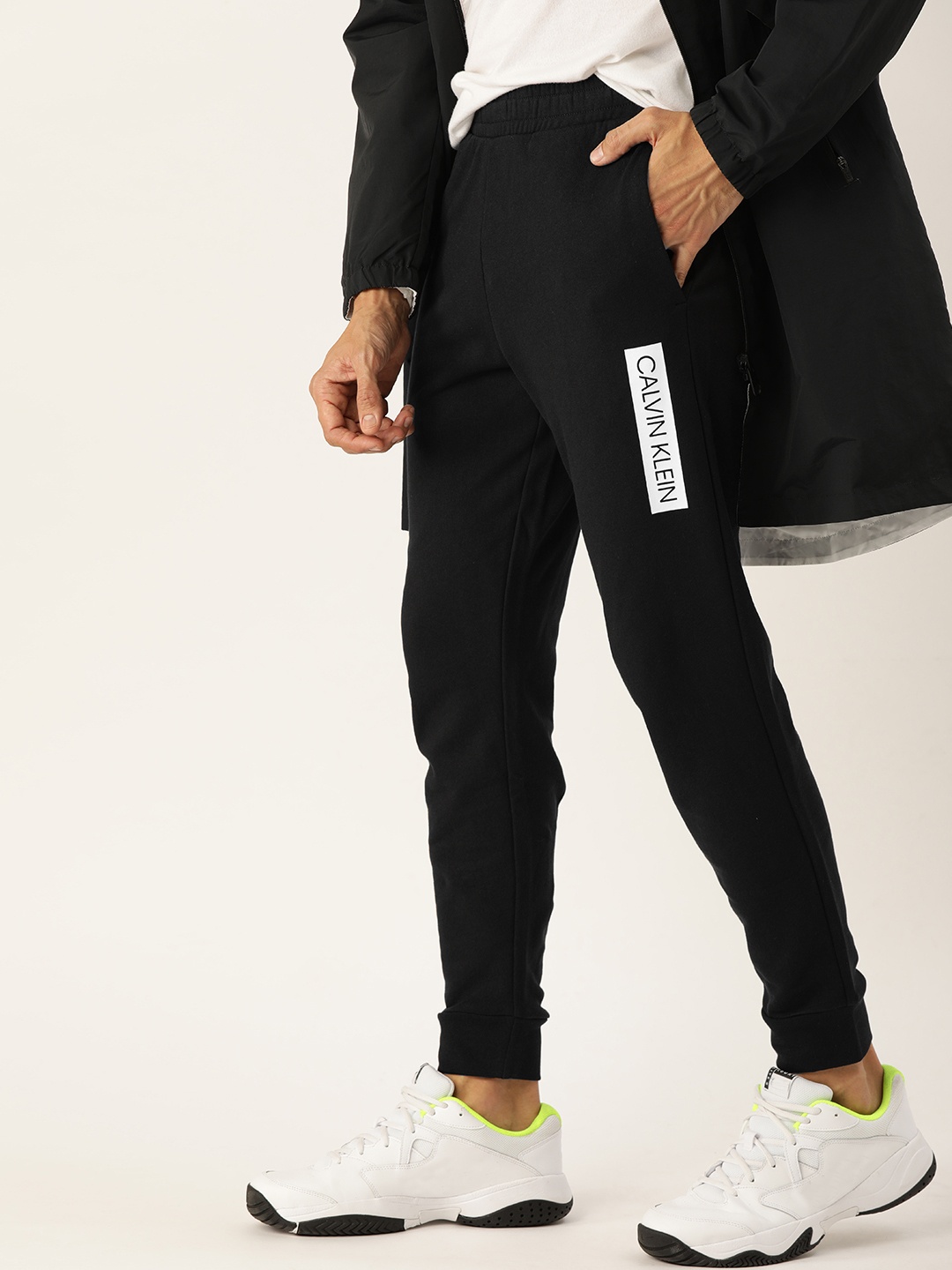 

Calvin Klein Jeans Men Black Solid Straight Fit Joggers with Printed Detail