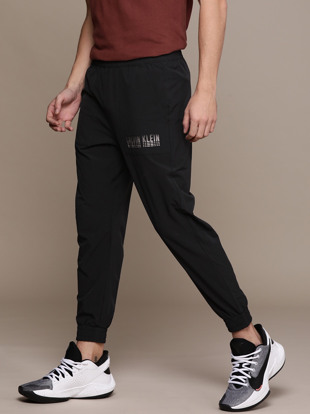 

Calvin Klein Jeans Men Black Straight Fit Solid Joggers