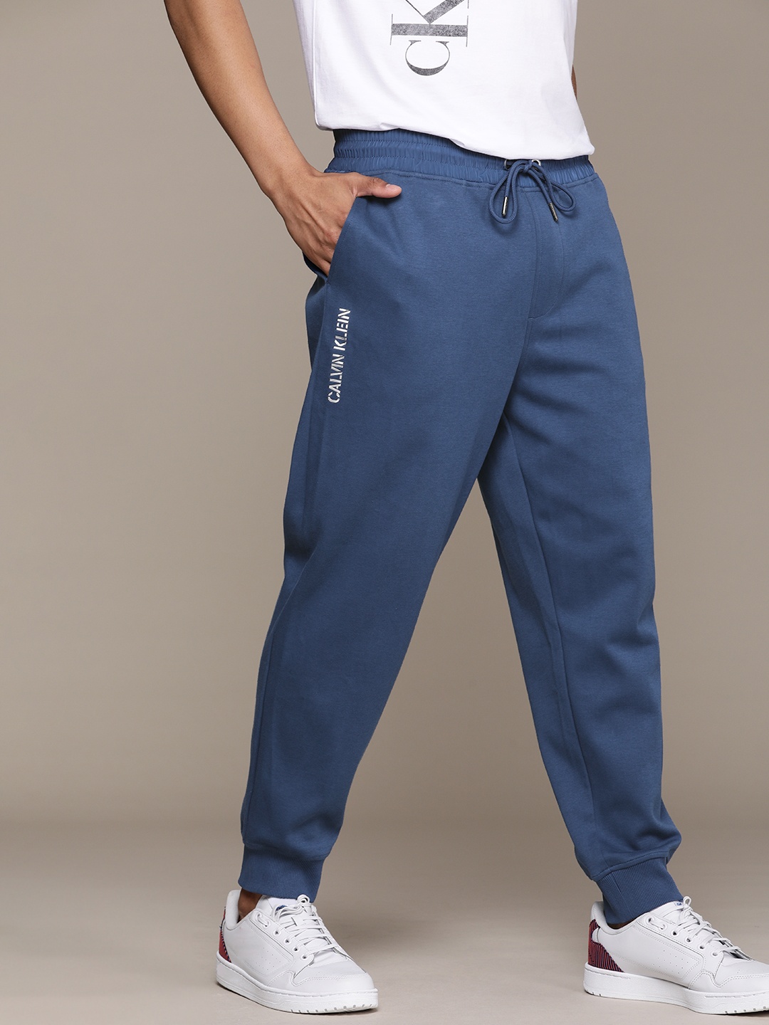 

Calvin Klein Jeans Men Blue Solid Regular Fit Joggers