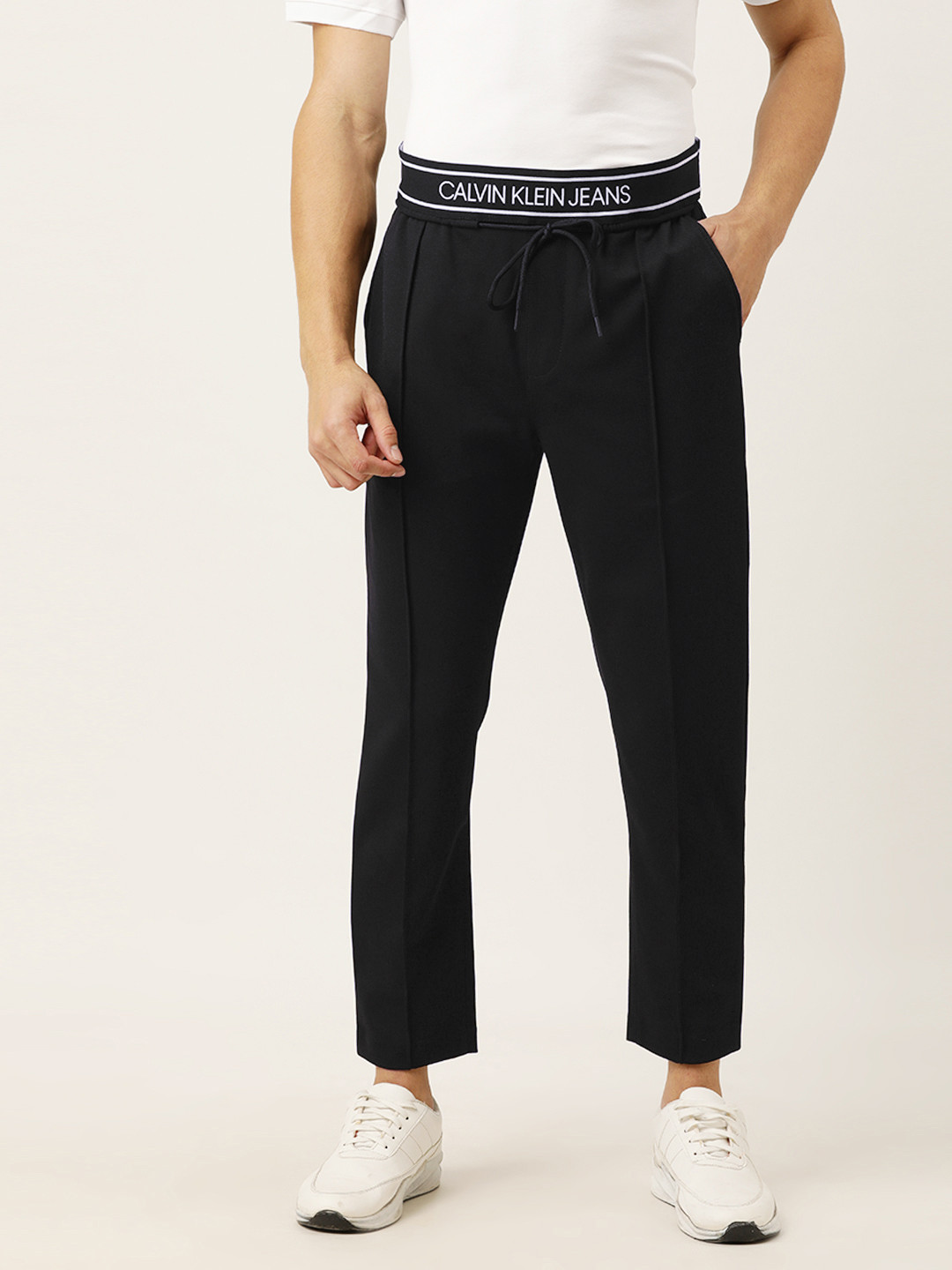 

Calvin Klein Jeans Men Black Solid Slim Fit Track Pants