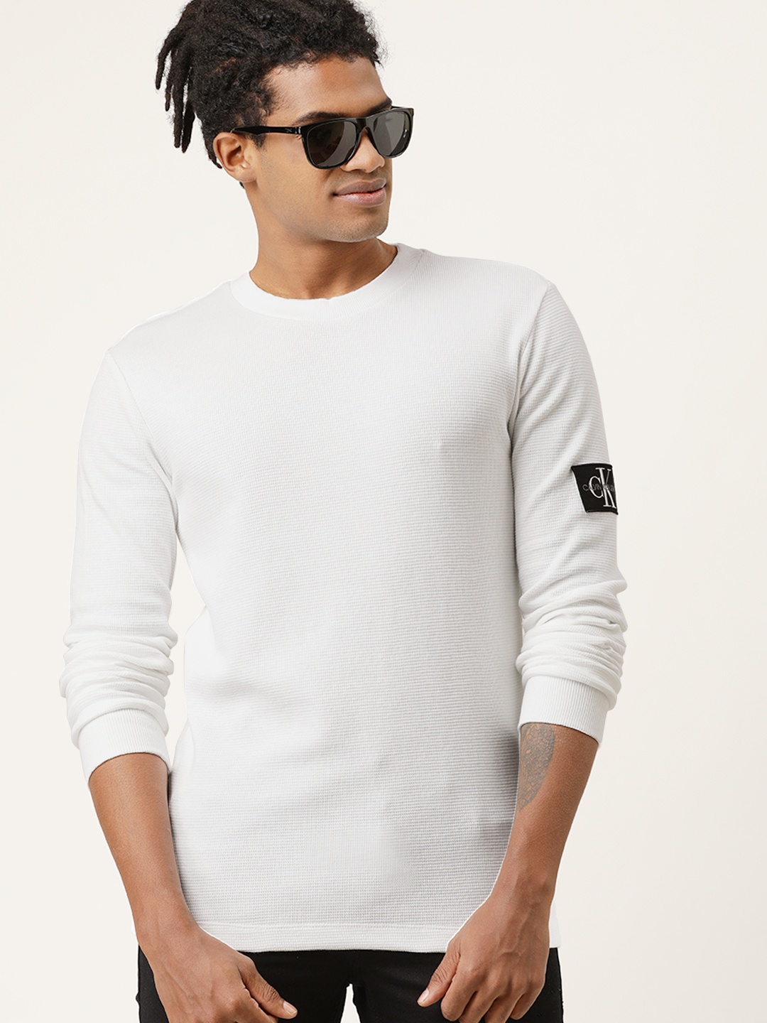 

Calvin Klein Jeans Men White Solid Round Neck T-shirt