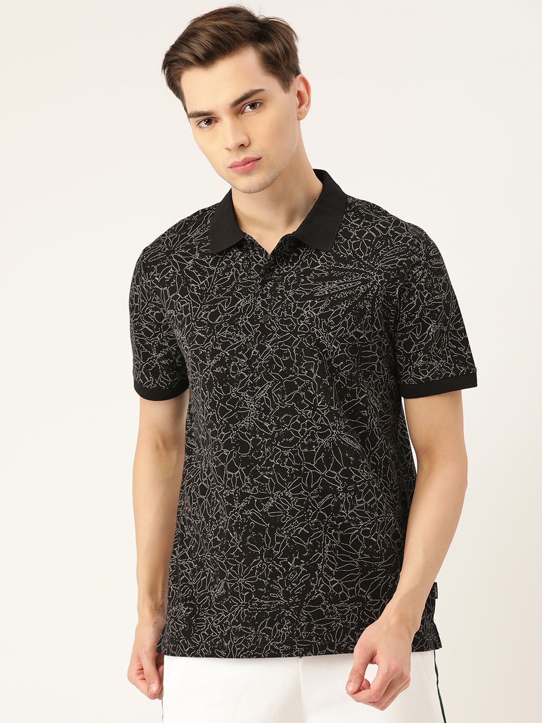 

Calvin Klein Jeans Men Black & White Printed Polo Collar T-shirt