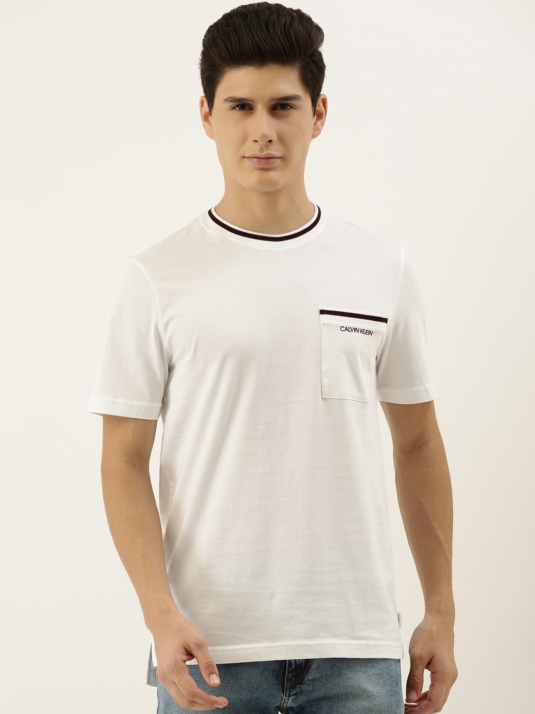 

Calvin Klein Jeans Men White Solid Round Neck T-shirt