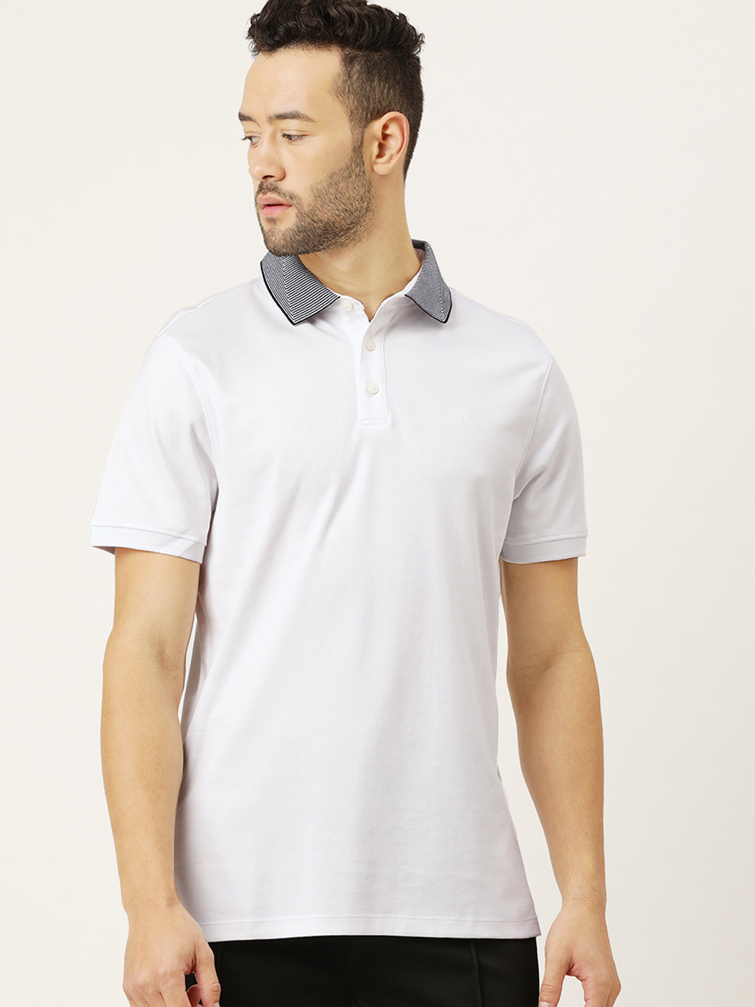 

Calvin Klein Jeans Men White Solid Polo Collar Pure Cotton T-shirt