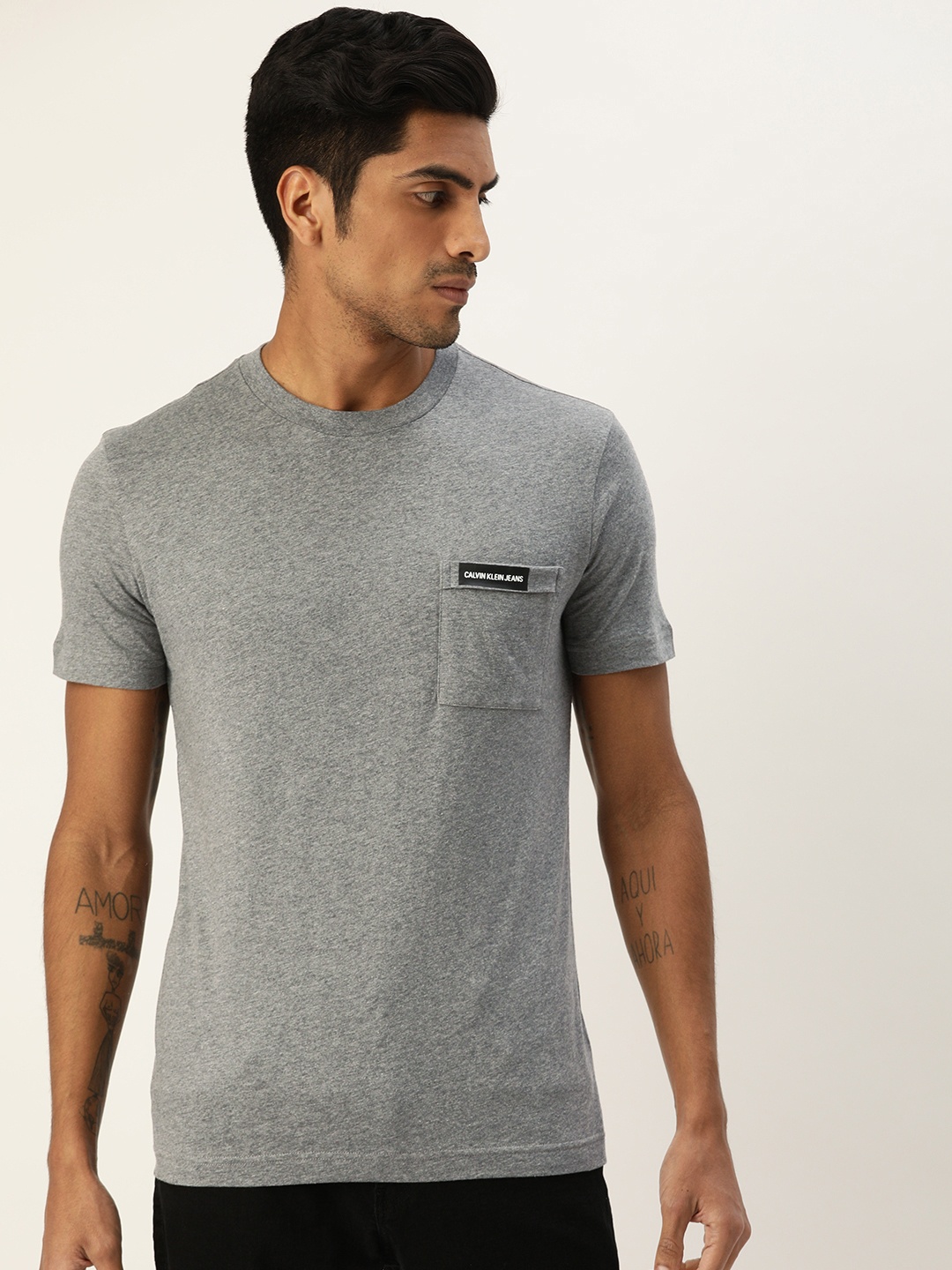 

Calvin Klein Jeans Men Grey Melange Printed Round Neck Pure Cotton T-shirt