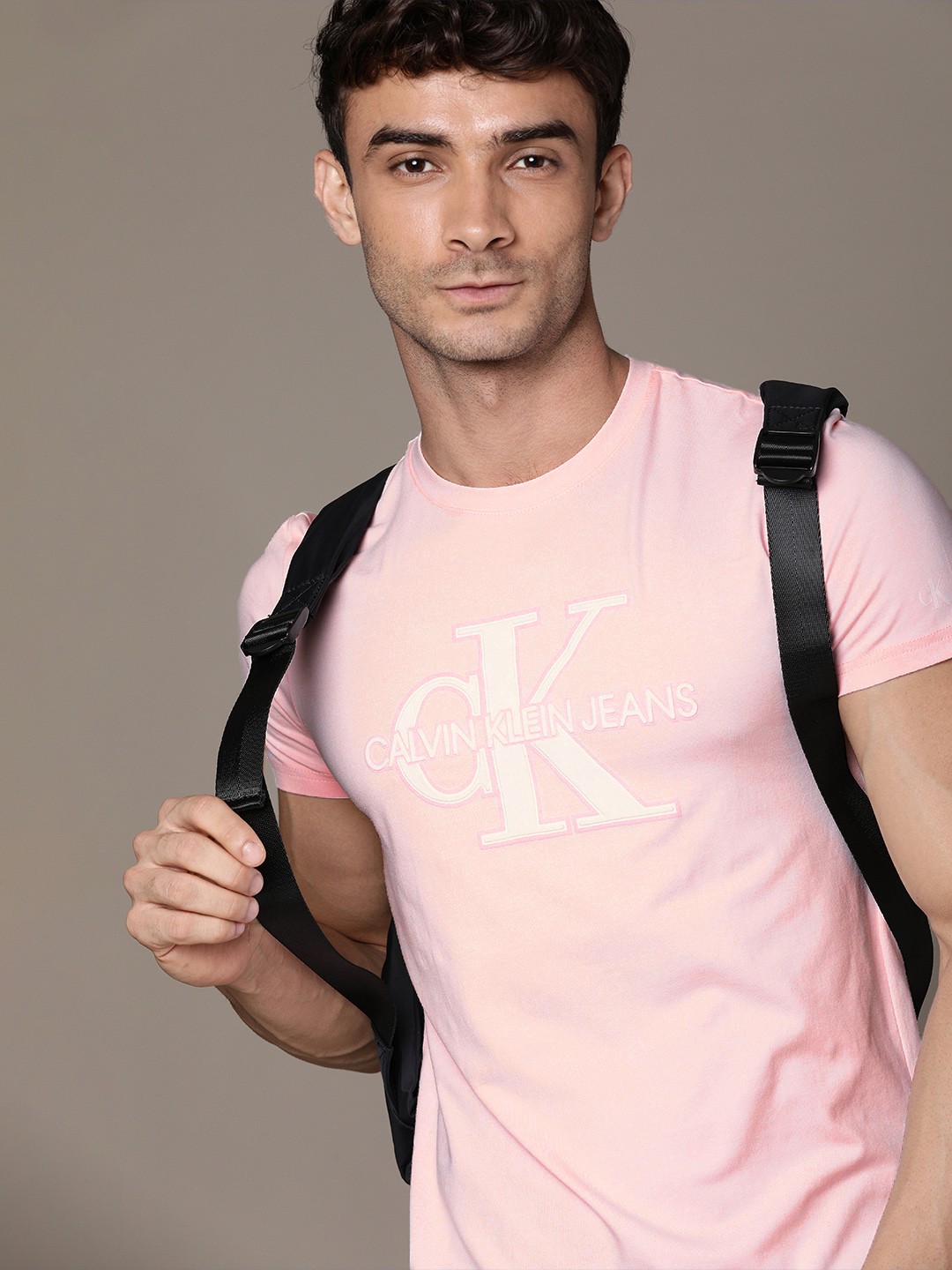 

Calvin Klein Jeans Men Pink Brand Logo Printed Slim Fit T-shirt
