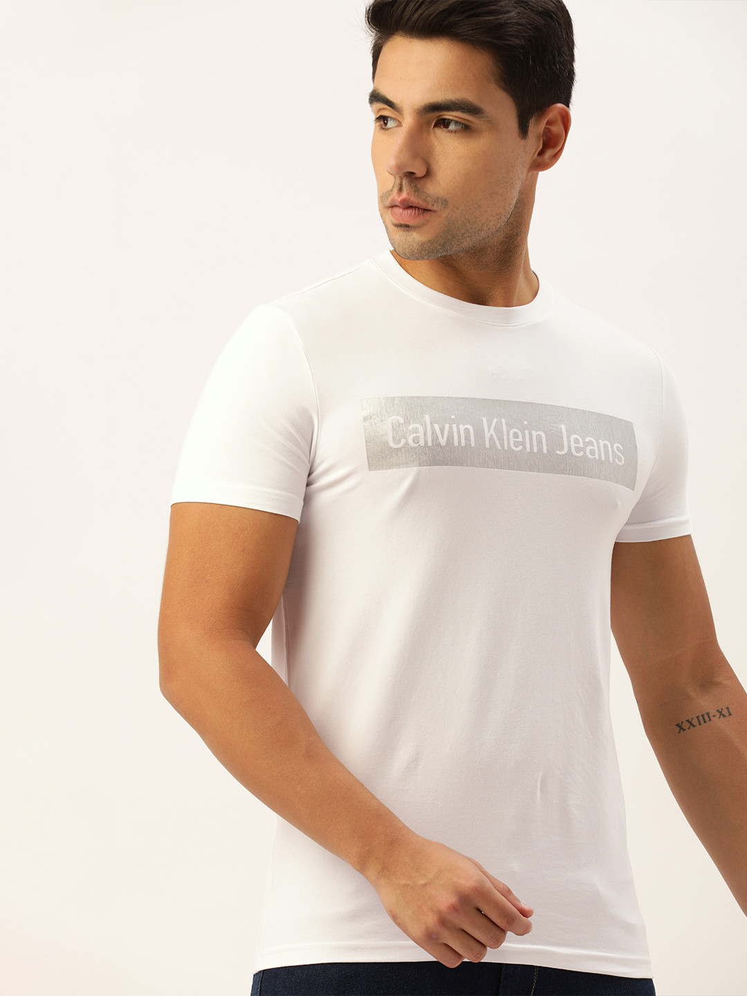 

Calvin Klein Jeans Men White Slim Fit Logo Printed Round Neck T-shirt
