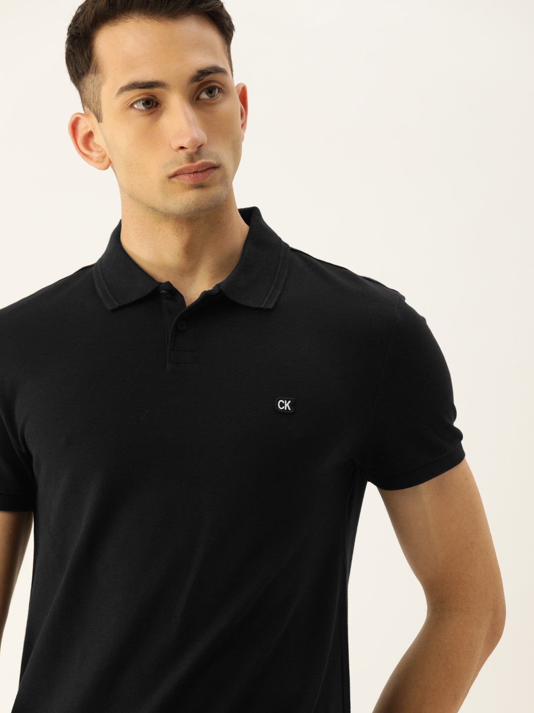 

Calvin Klein Jeans Men Black Slim Fit Solid Round Neck T-shirt