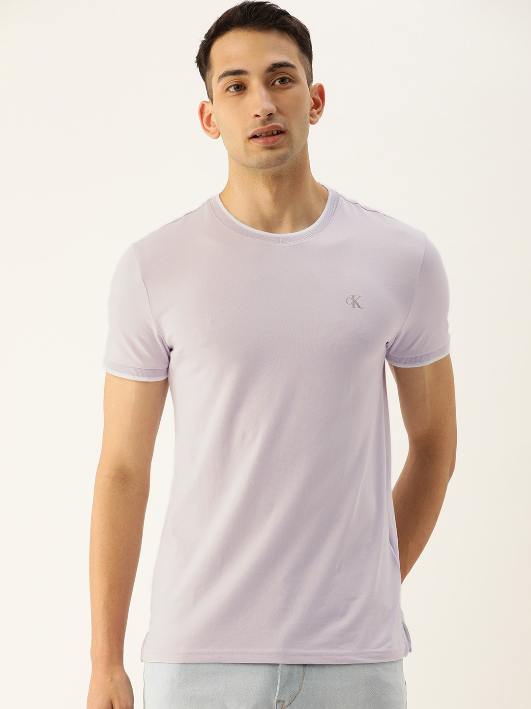 

Calvin Klein Jeans Men Lavender Solid Round Neck T-shirt