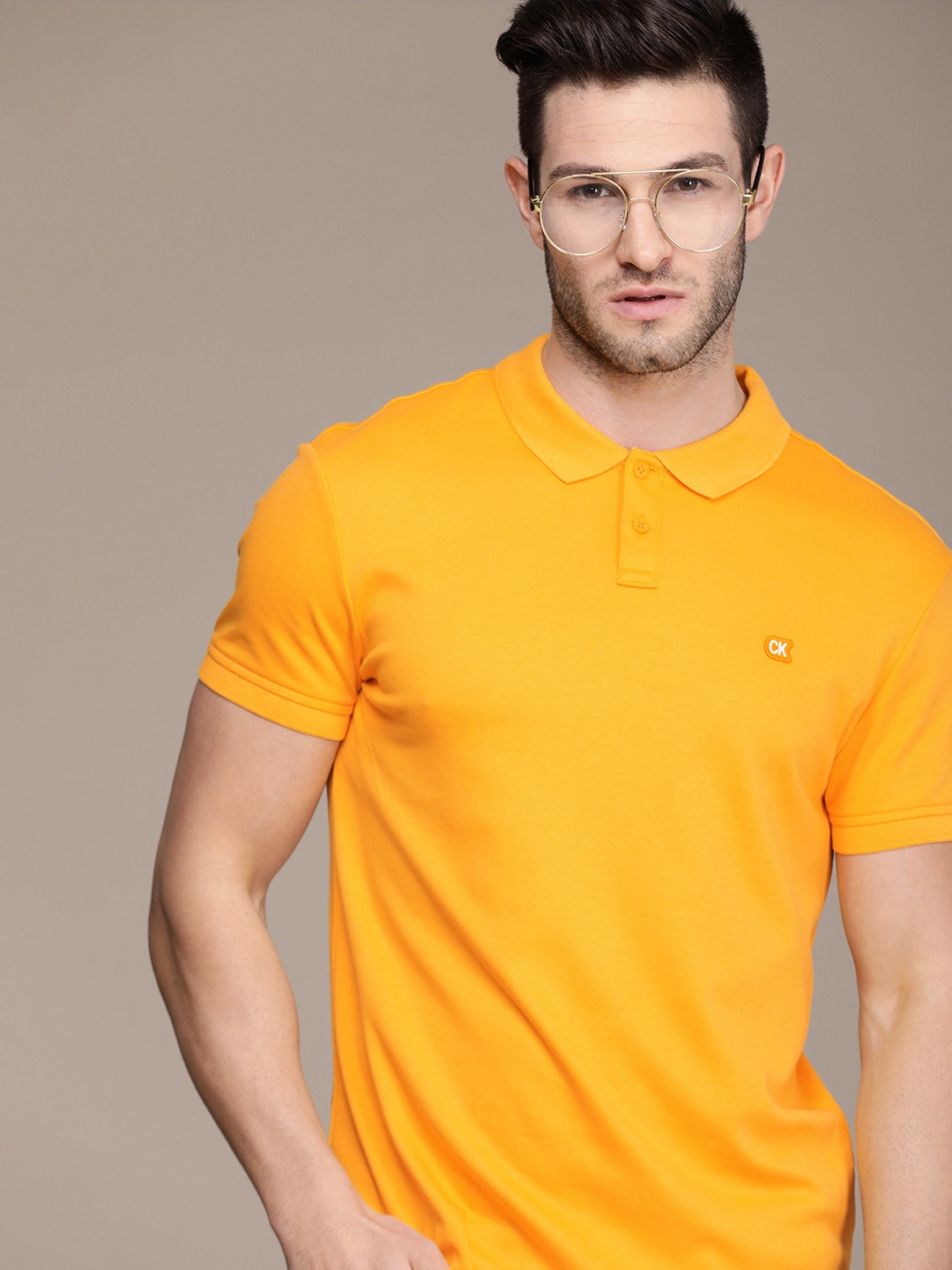 

Calvin Klein Jeans Men Mustard Yellow Polo Collar Slim Fit T-shirt