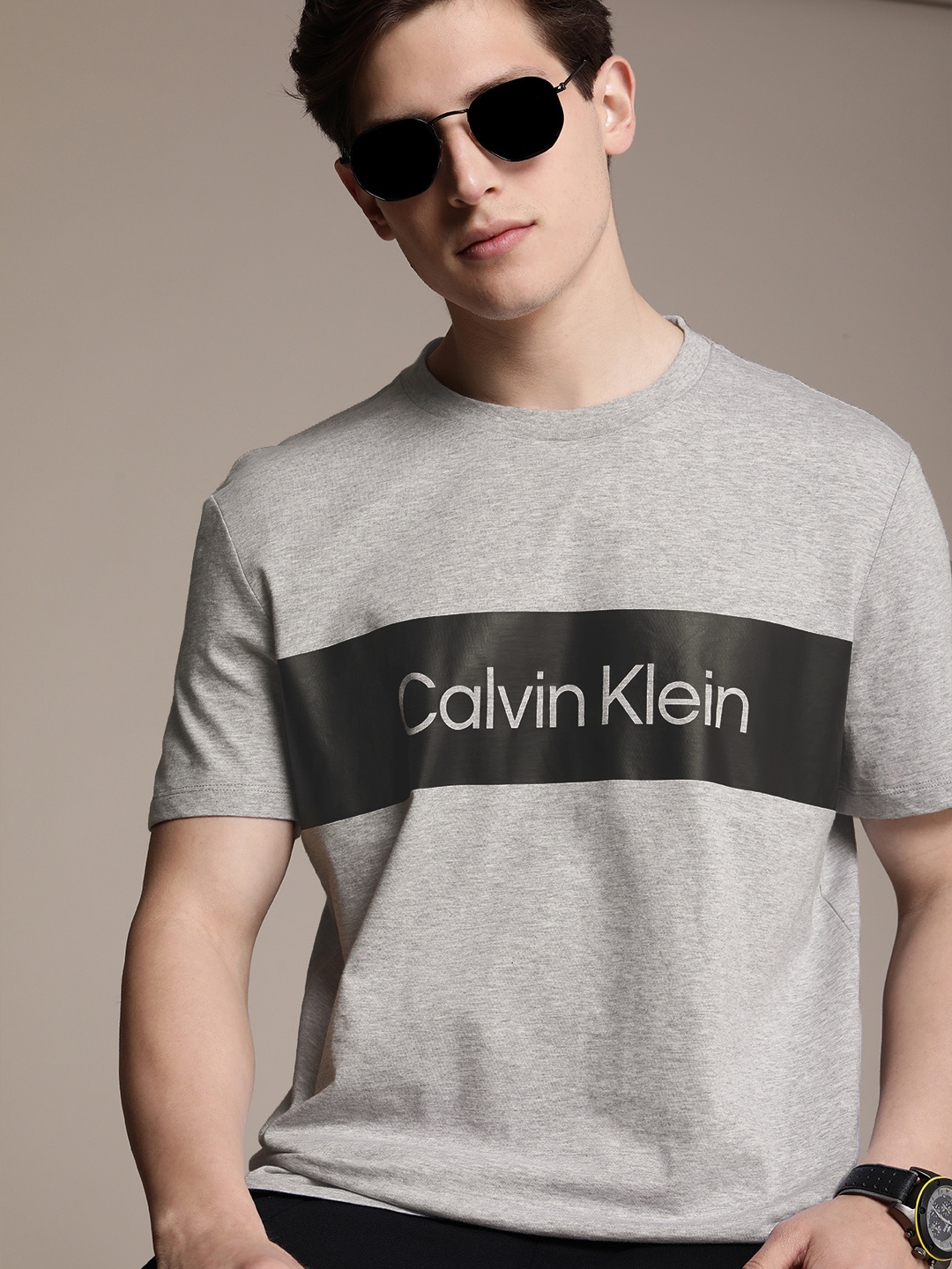 

Calvin Klein Jeans Men Grey Brand Logo Printed T-shirt