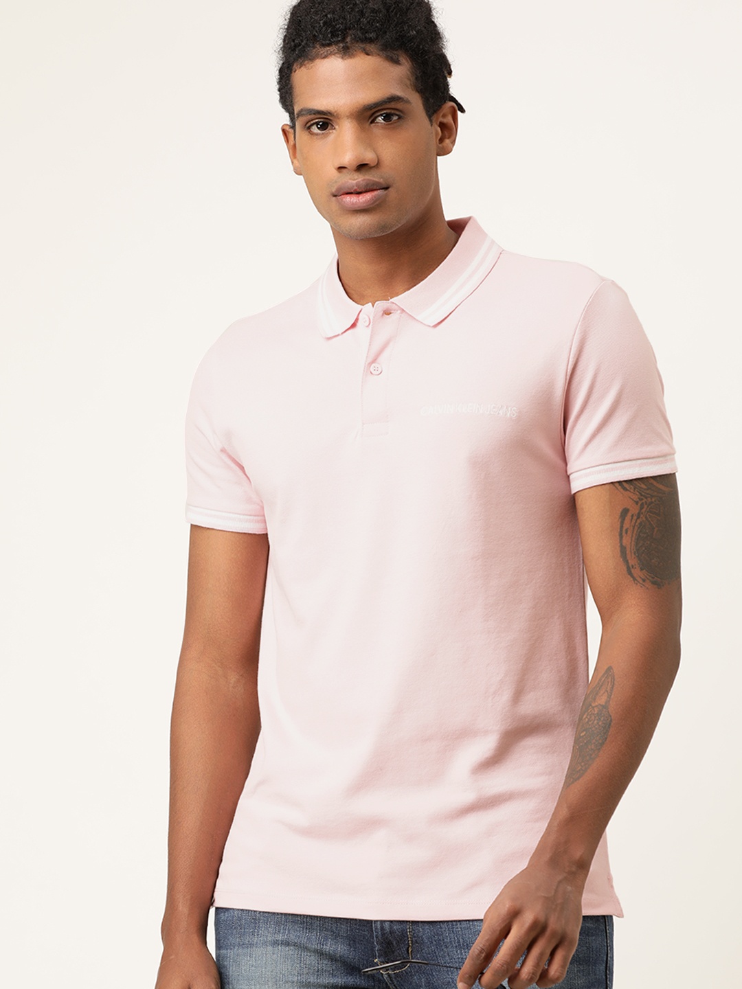 

Calvin Klein Jeans Men Pink Solid Round Neck Pure Cotton T-shirt