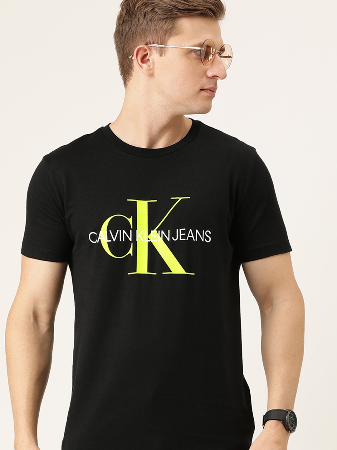 

Calvin Klein Jeans Men Black Printed Round Neck Pure Cotton T-shirt