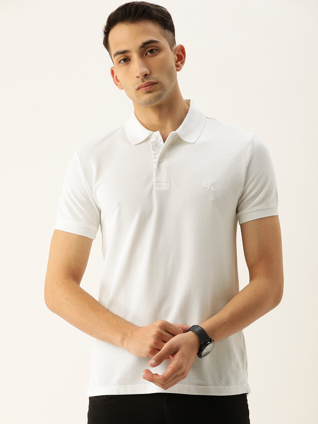 

Calvin Klein Jeans Men White Solid Slim Fit Polo Collar T-shirt