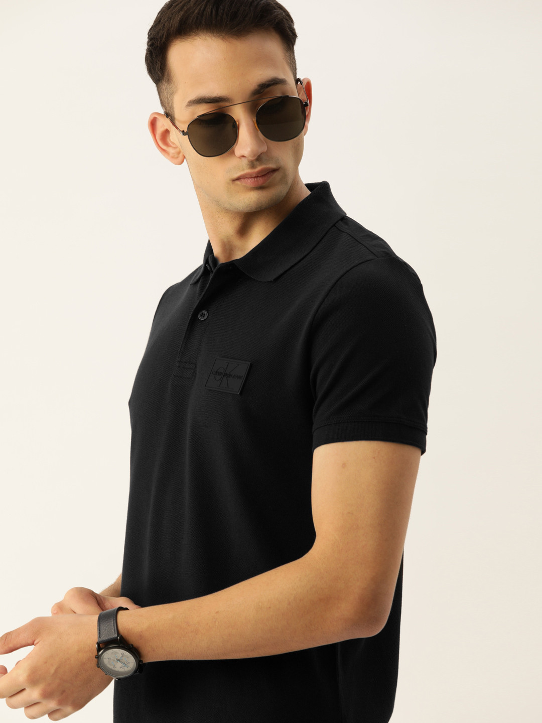 

Calvin Klein Jeans Men Black Solid Slim Fit Polo Collar Pure Cotton T-shirt
