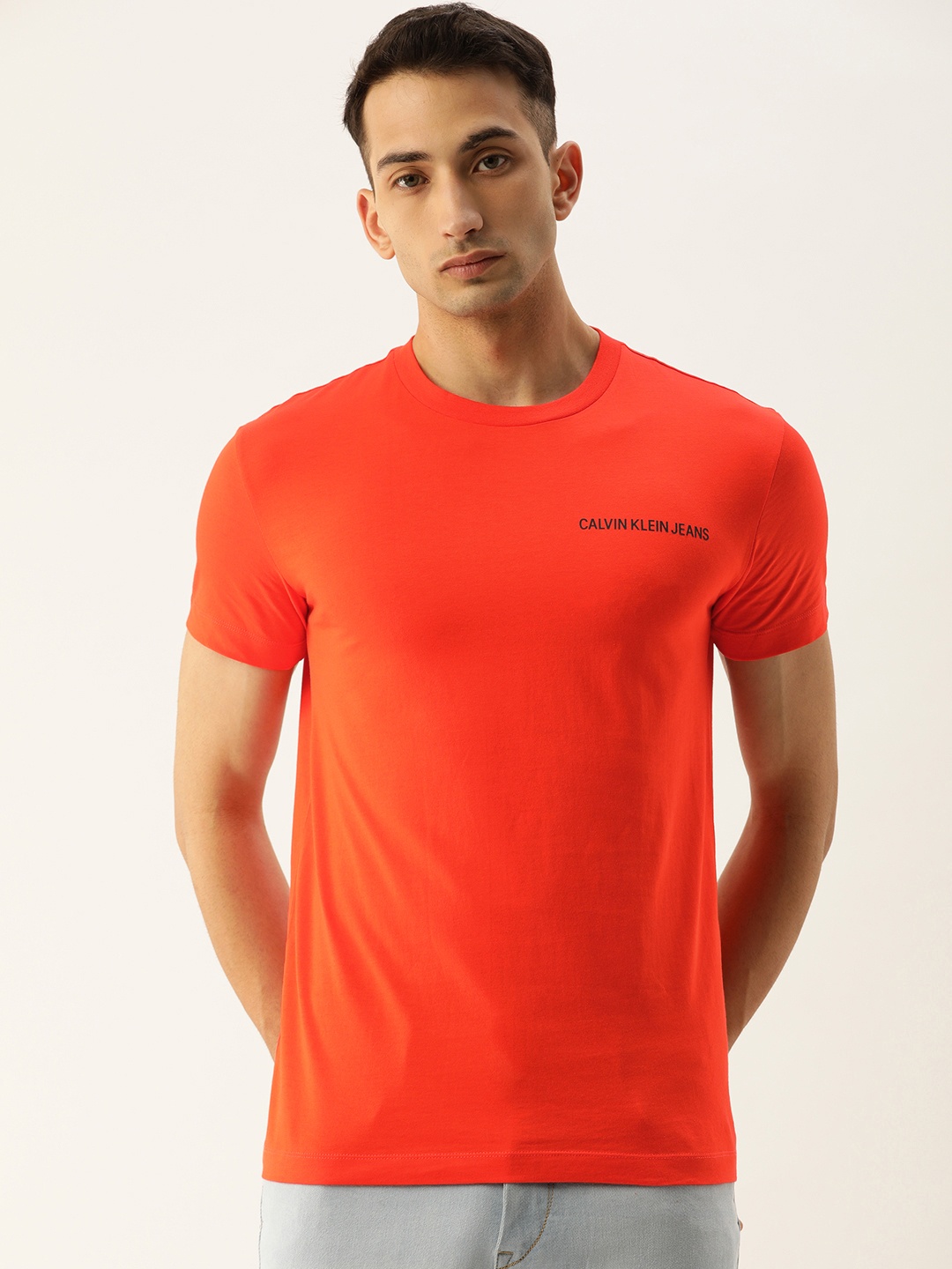 

Calvin Klein Jeans Men Red Solid Round Neck T-shirt
