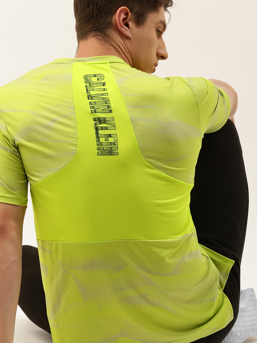 

Calvin Klein Jeans Men Fluorescent Green Printed Round Neck Workout T-shirt