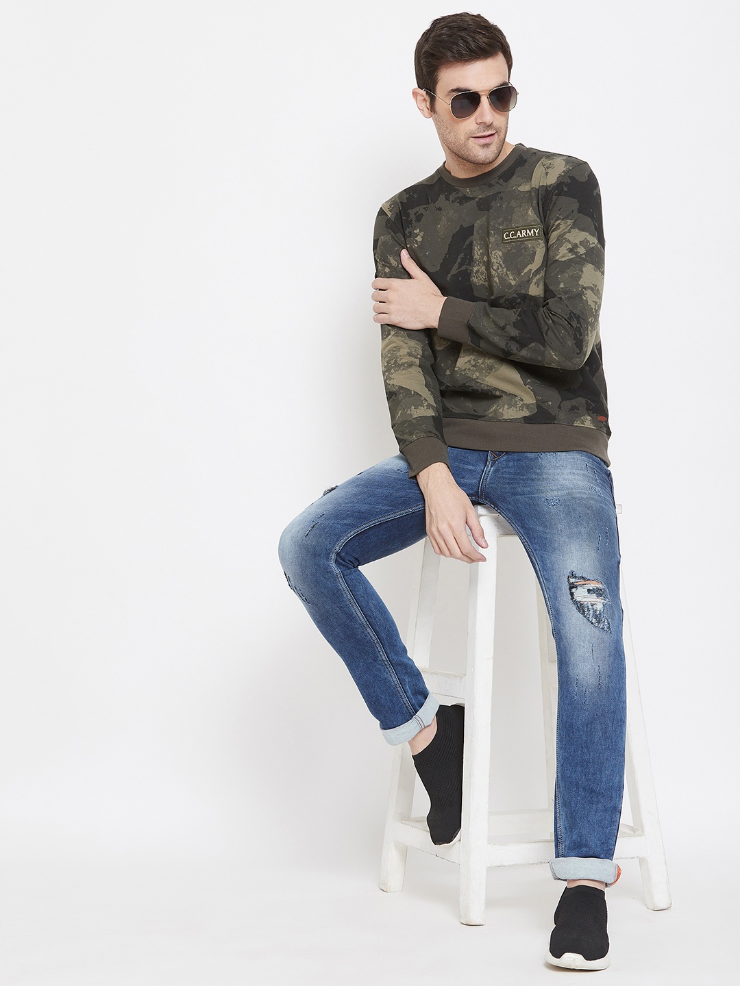 

Crimsoune Club Men Olive Green & Beige Printed Sweatshirt