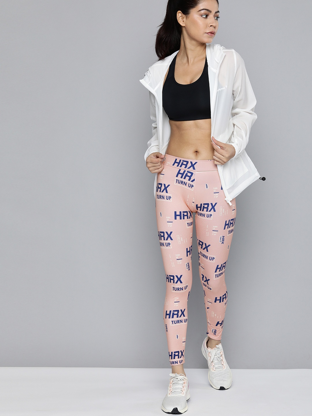 

HRX by Hrithik Roshan Women Peach Colored Printed Training Tights