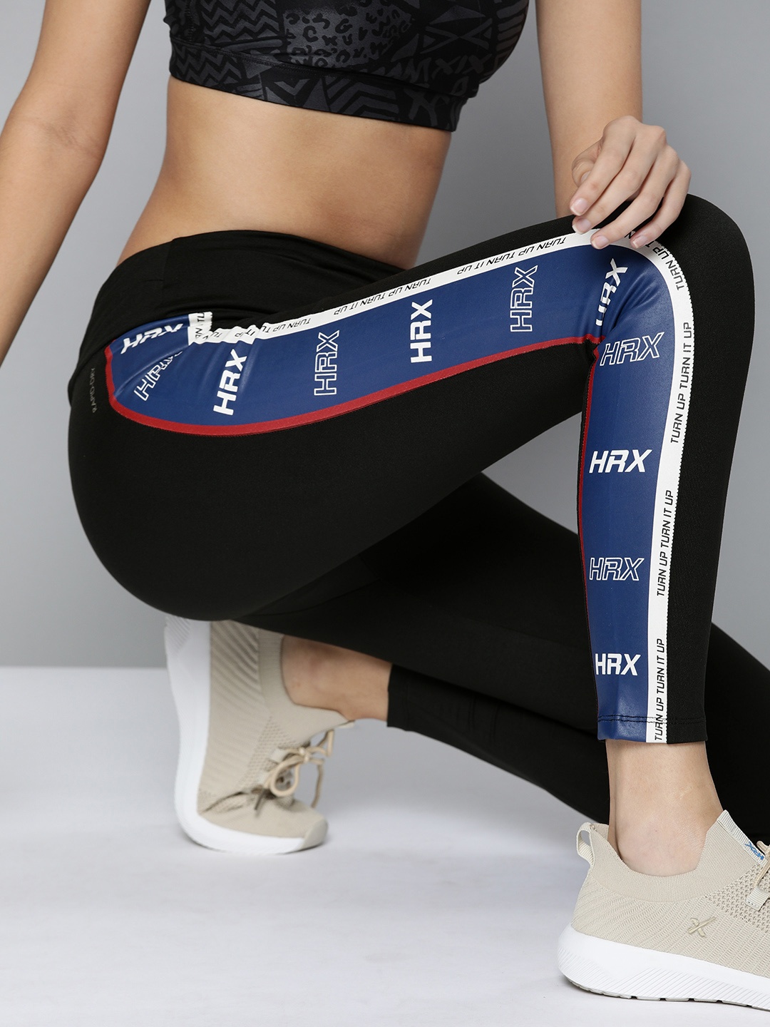 

HRX by Hrithik Roshan Women Black Solid Rapid-Dry Antimicrobial Training Tights