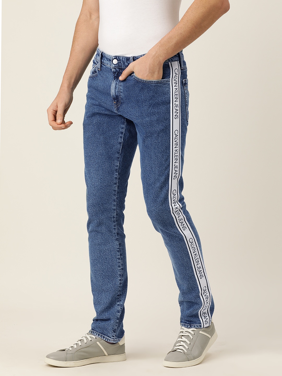 

Calvin Klein Jeans Men Blue Slim Fit Mid-Rise Clean Look Stretchable Jeans with Logo Tape