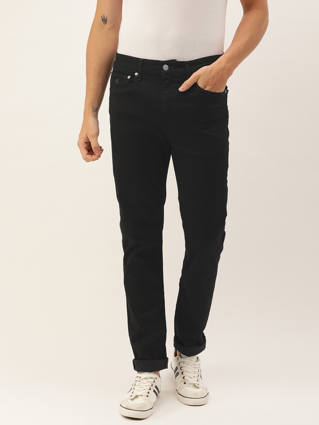 

Calvin Klein Jeans Men Black Tapered Fit Mid-Rise Clean Look Stretchable Jeans