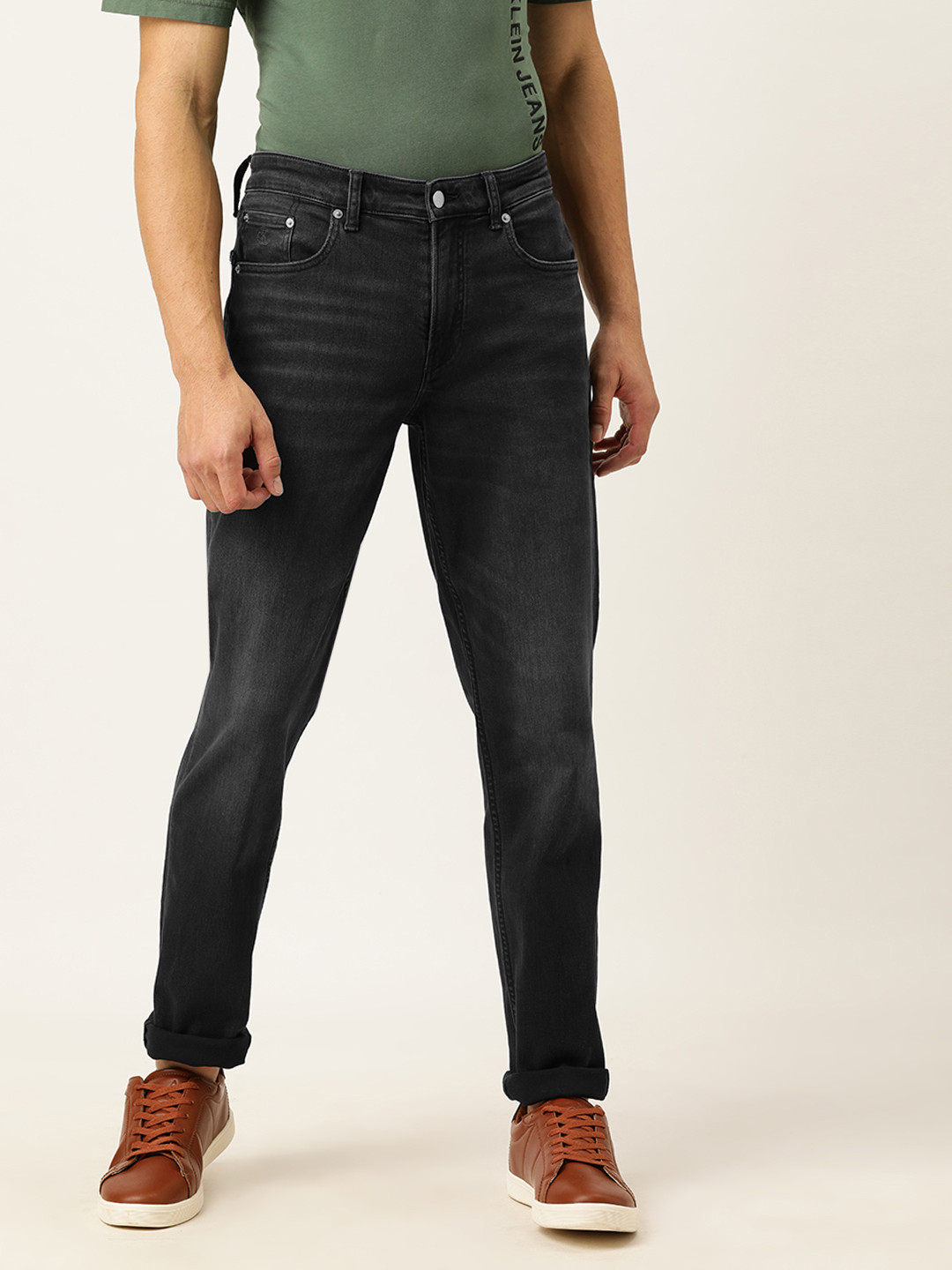 

Calvin Klein Jeans Men Black Tapered Fit Mid-Rise Clean Look Stretchable Jeans