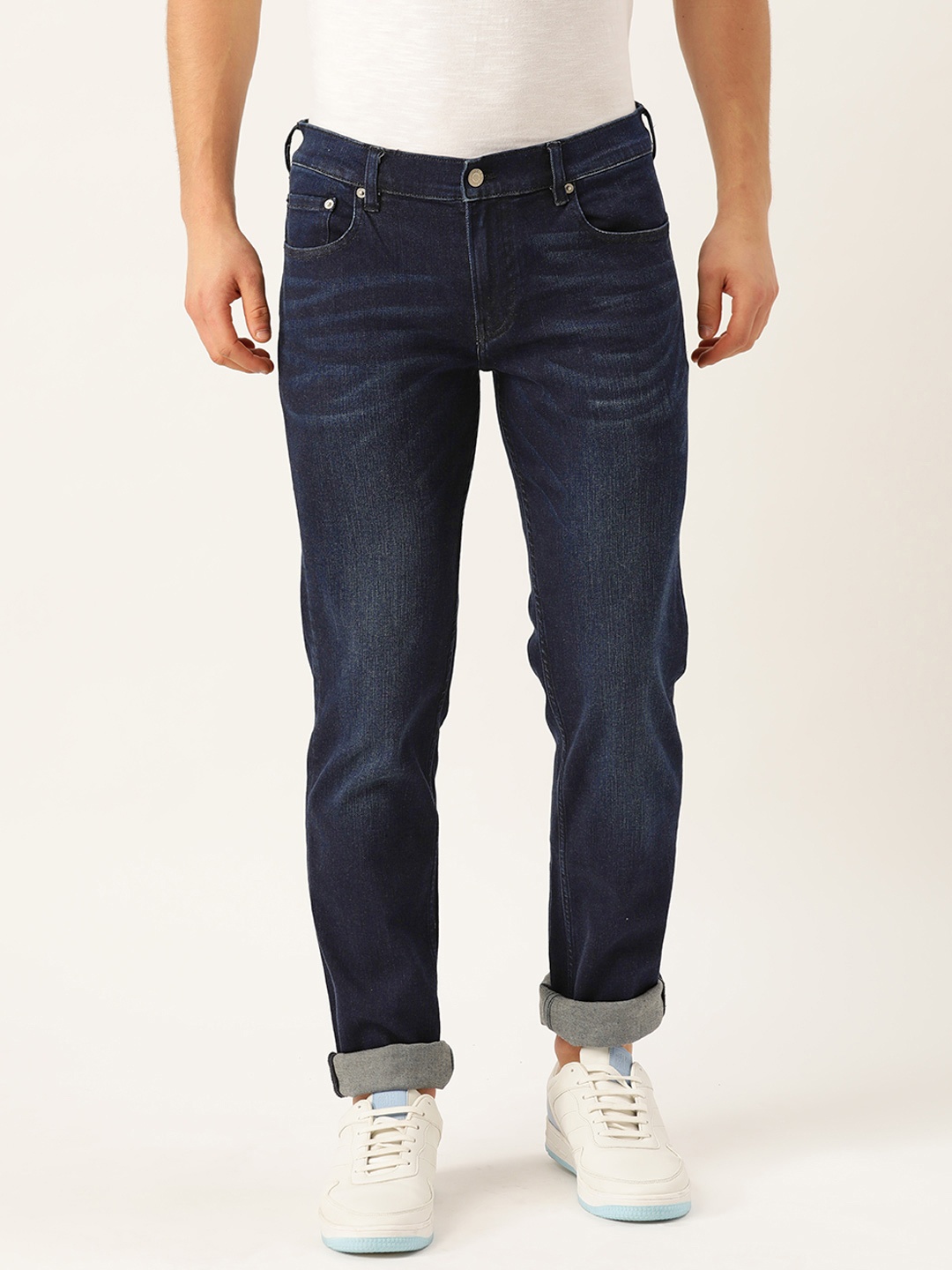 

Calvin Klein Jeans Men Blue Tapered Fit Mid-Rise Clean Look Stretchable Jeans