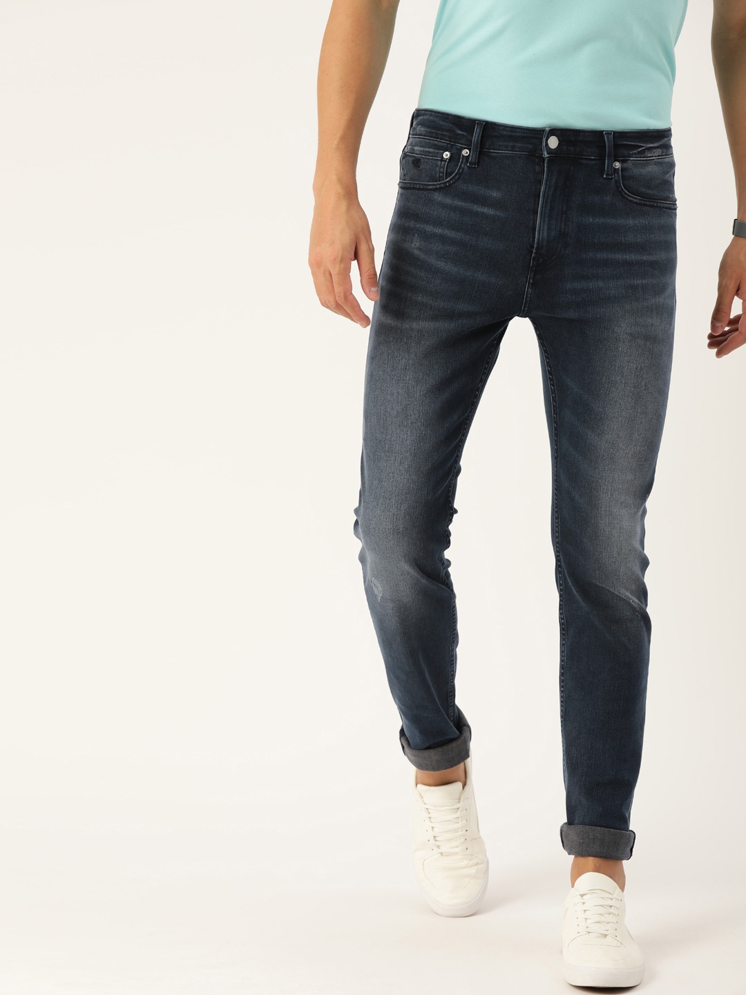 

Calvin Klein Jeans Men Blue Slim Fit Mid-Rise Mildly Distressed Jeans