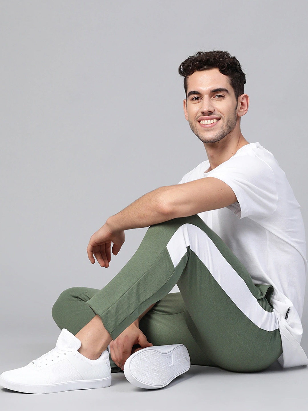 

Mast & Harbour Men Olive Green Solid Track Pants