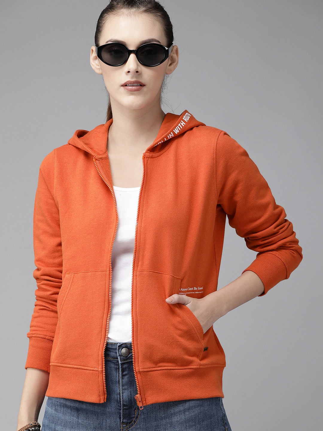 

Roadster Women Orange Solid Greenturn Hooded Sustainable Sweatshirt