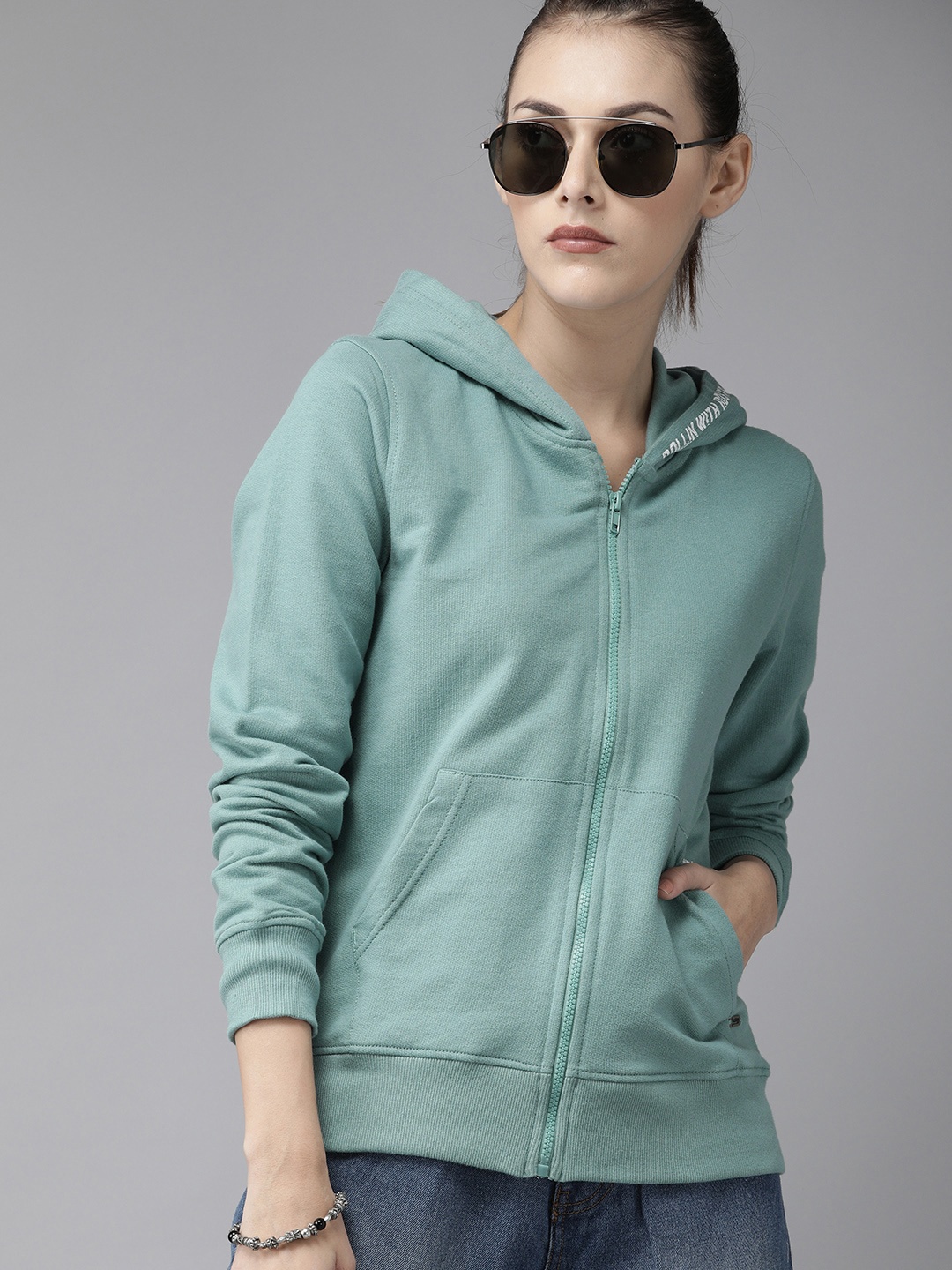 

Roadster Women Green Solid Greenturn Hooded Sweatshirt