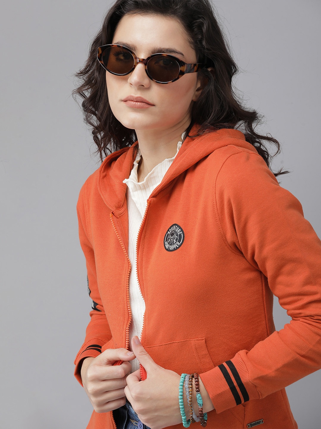 

Roadster Women Orange Solid Hooded Sweatshirt