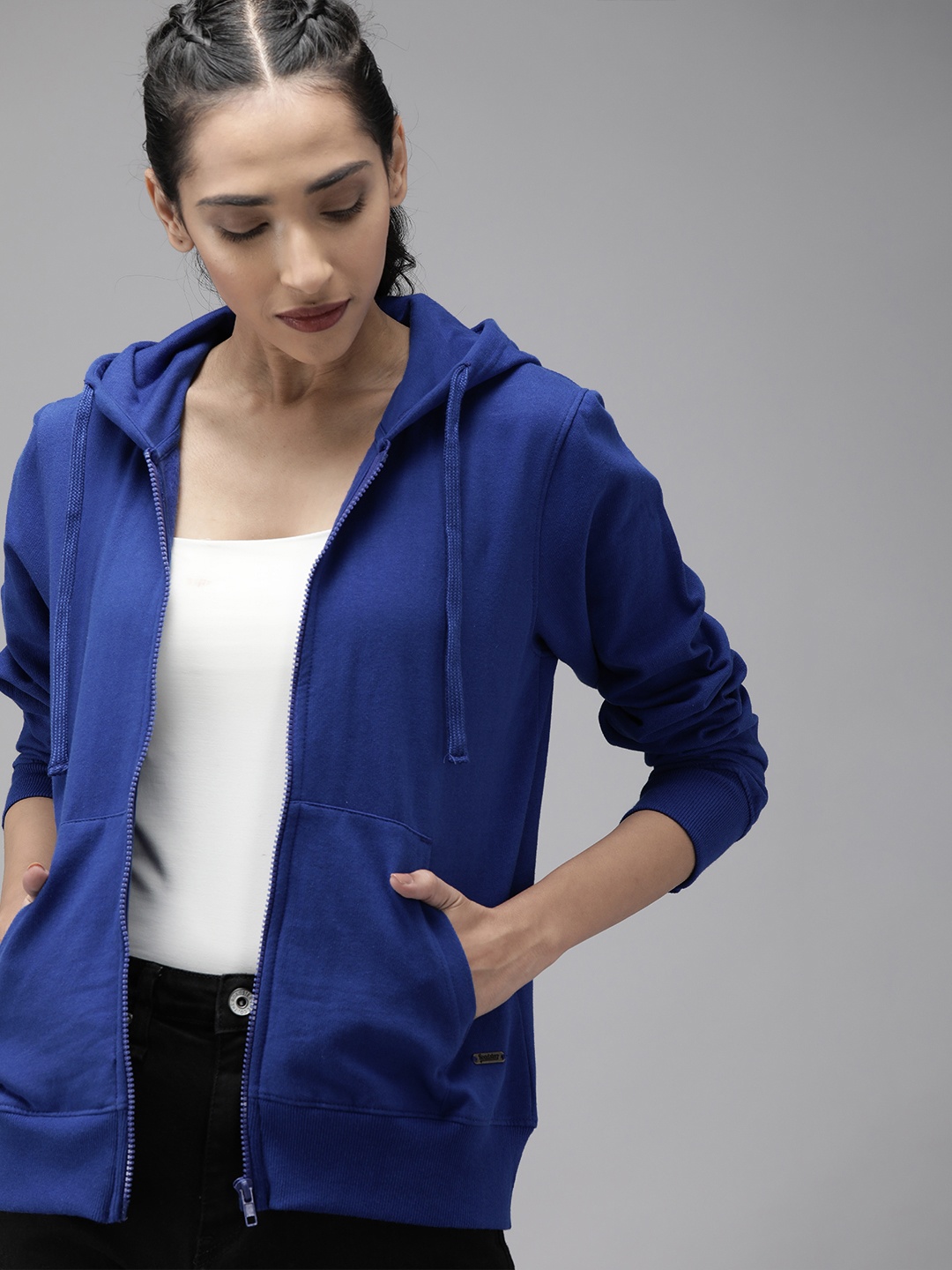 

Roadster Women Blue Solid Hooded Sweatshirt