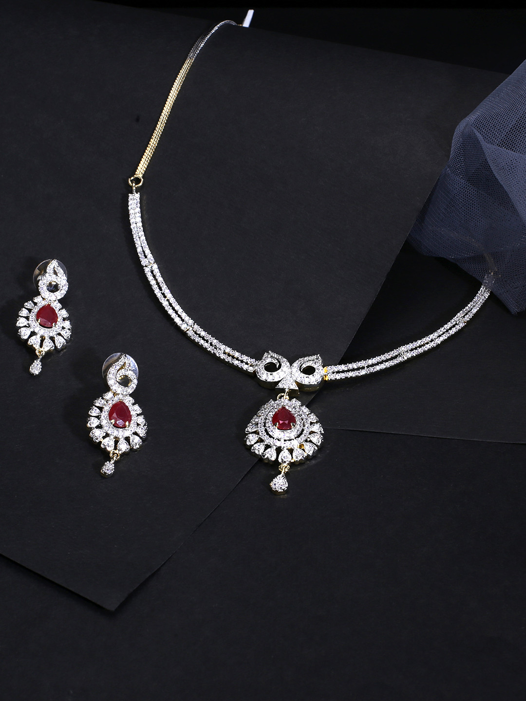 

Yellow Chimes Women Gold-Plated American Diamond Studded Jewellery Set
