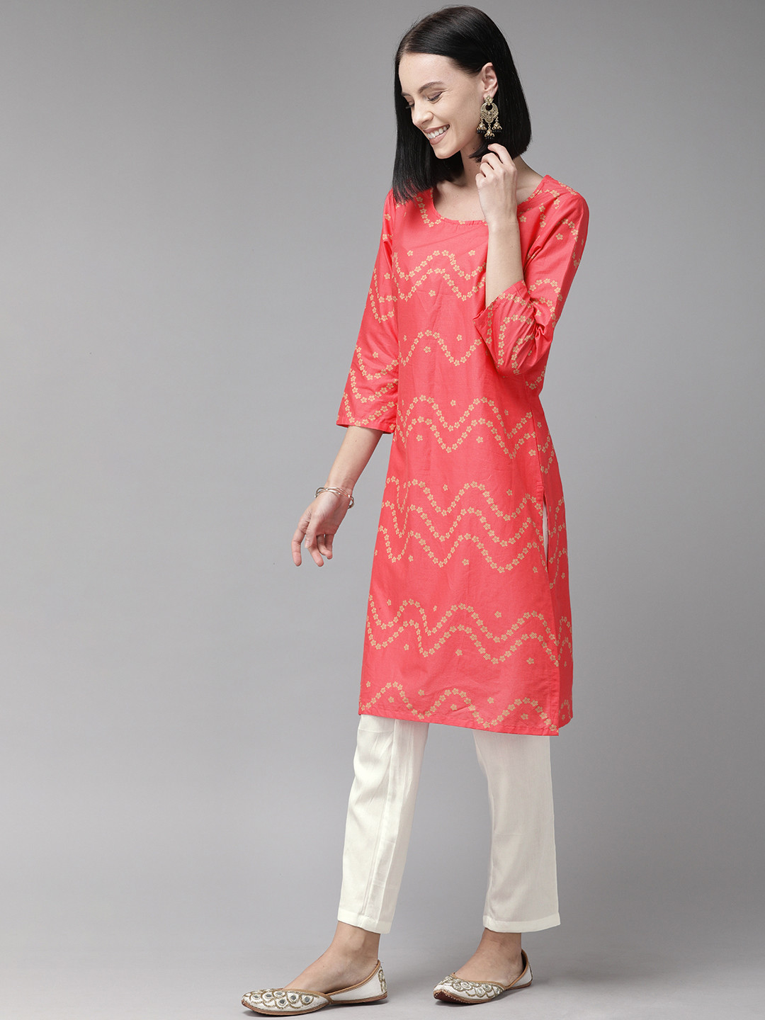 

Anouk Women Peach-Coloured & White Printed Kurta with Trousers