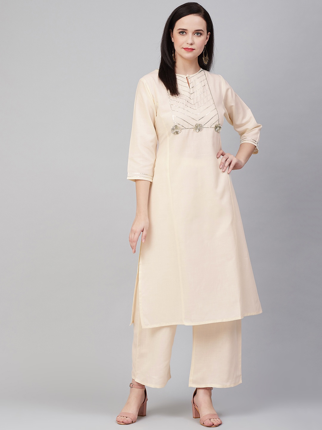 

Bhama Couture Women Cream-Coloured Yoke Design Kurta with Palazzos