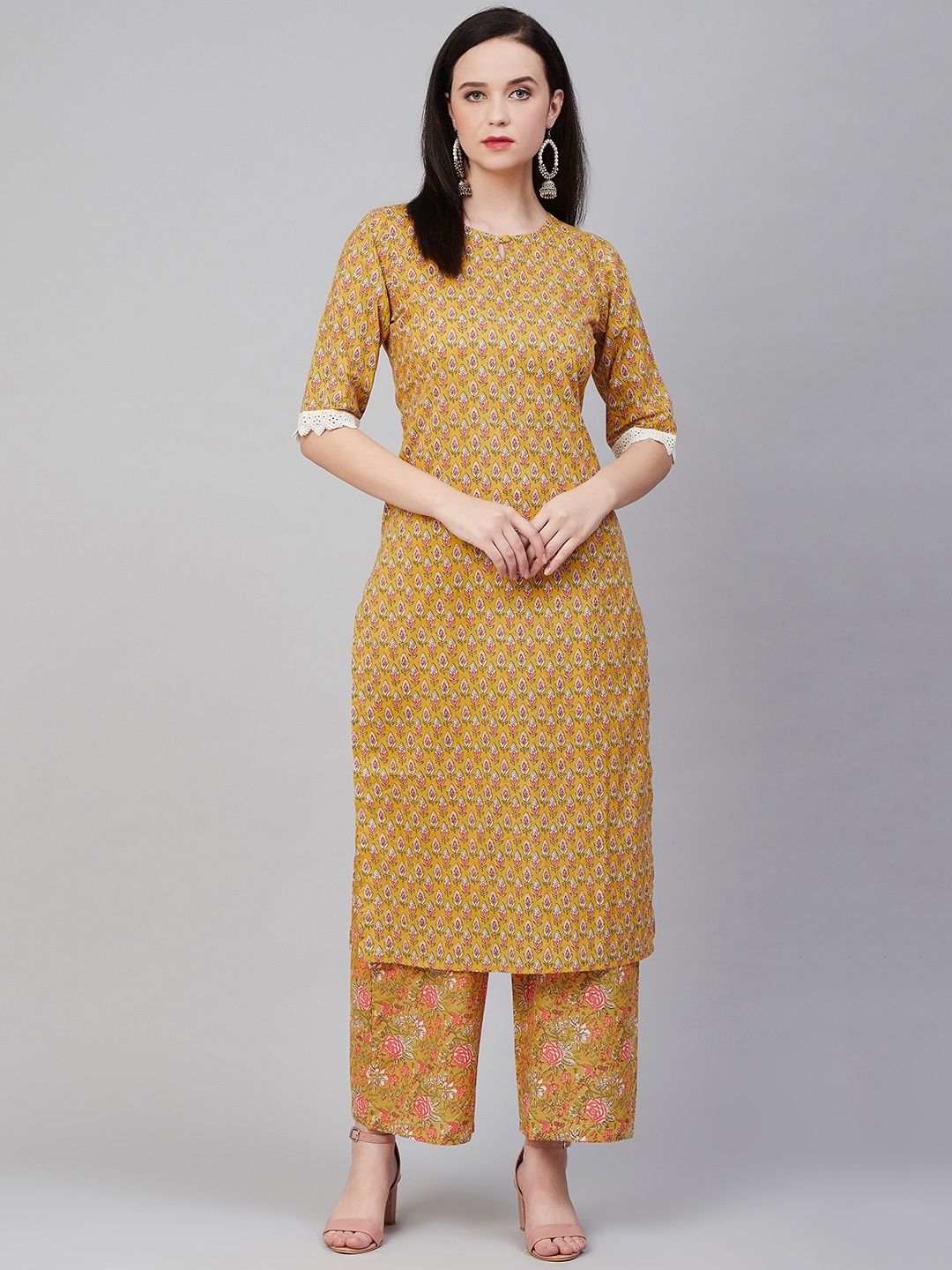 

Bhama Couture Women Mustard Yellow & Pink Printed Kurta with Palazzos
