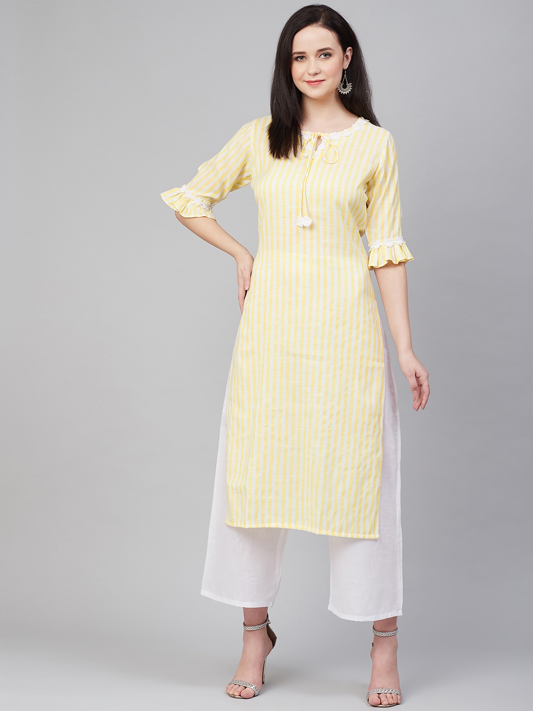 

Bhama Couture Women Yellow & White Striped Kurta with Palazzos