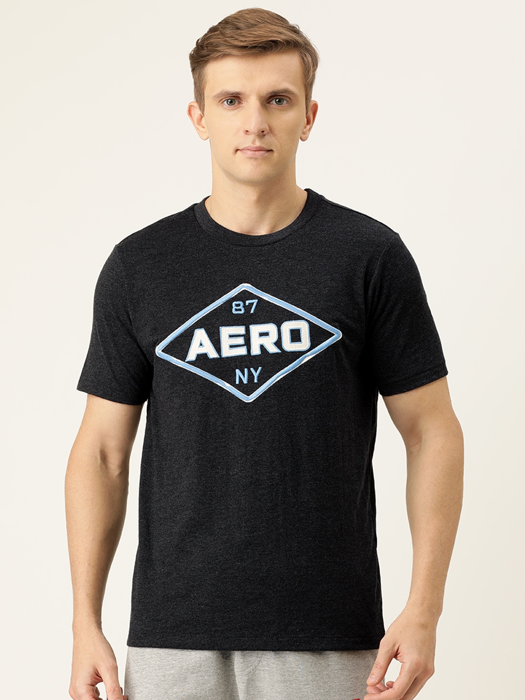 

Aeropostale Men Charcoal and White Printed Round Neck T-shirt